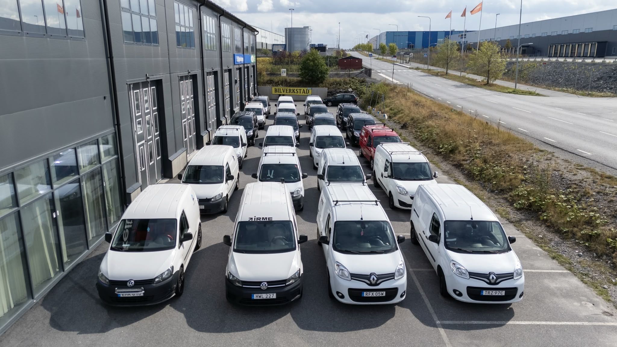 Part of the Hera Transport fleet parked outside the warehouse